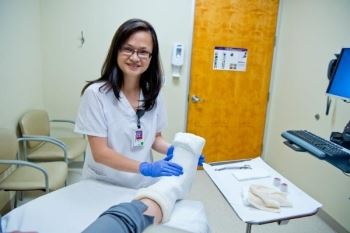 nurse helping patient
